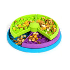 Colorful pet toy with food compartments on a white background