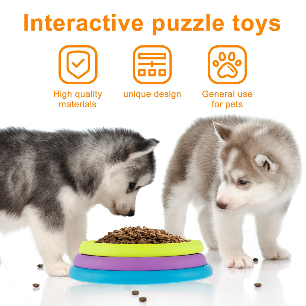 Two puppies interacting with a colorful puzzle toy on a white background.