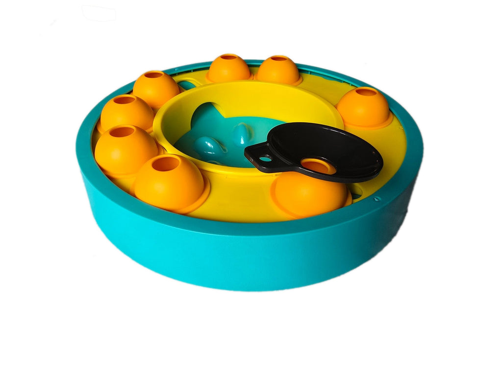 Colorful pet toy with multiple compartments on a white background